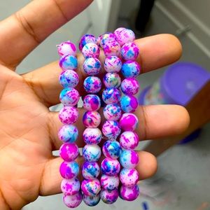 Splattered beaded bracelet stack